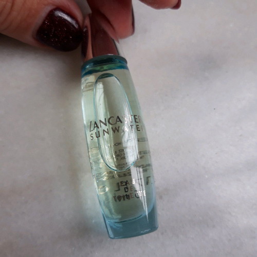 Set of used perfume miniatures