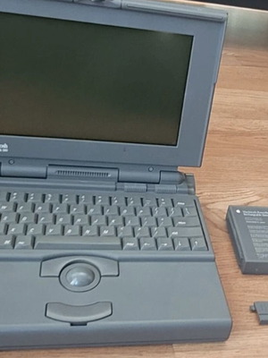 Apple PowerBook 180 laptop used with charger and floppy drive