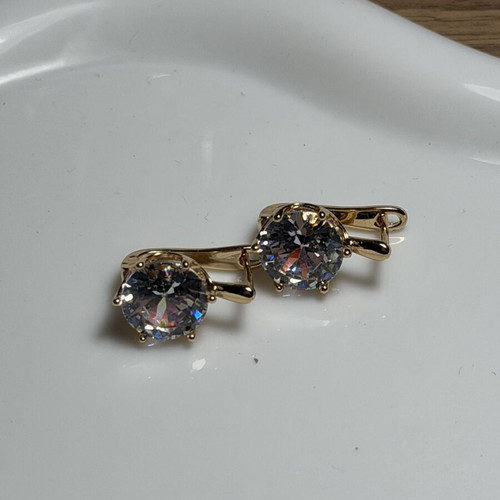 Earrings made of stainless steel, new, gold color
