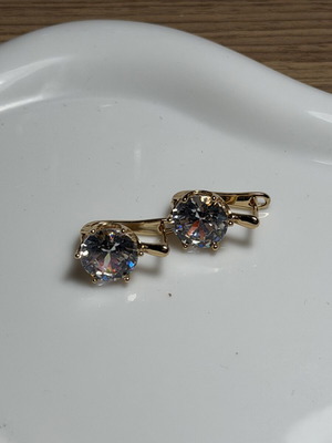 Earrings made of stainless steel, new, gold color