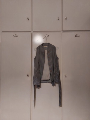 Namaste vest with beige pants like new