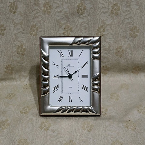 Clock with silver frame quartz used, table decorative
