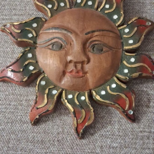 Carved wooden sun wall decor like new