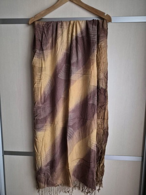 Pashmina scarf used in beige, brown and chocolate tones