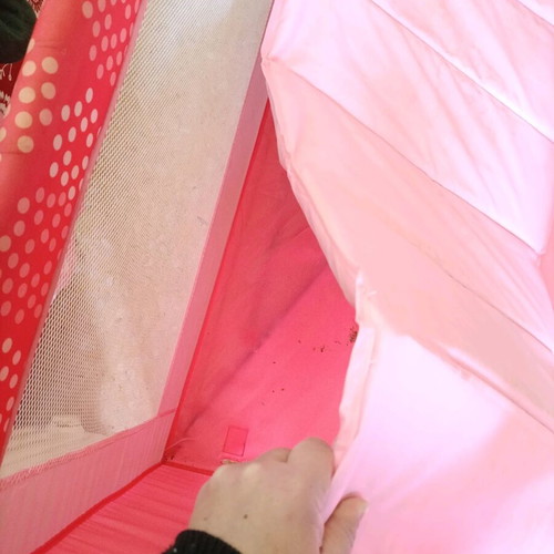 Pink baby playpen used