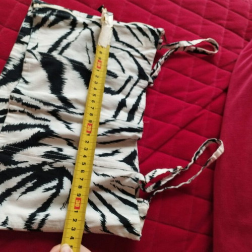Corset-style tiger print strap top with zipper, comfortable