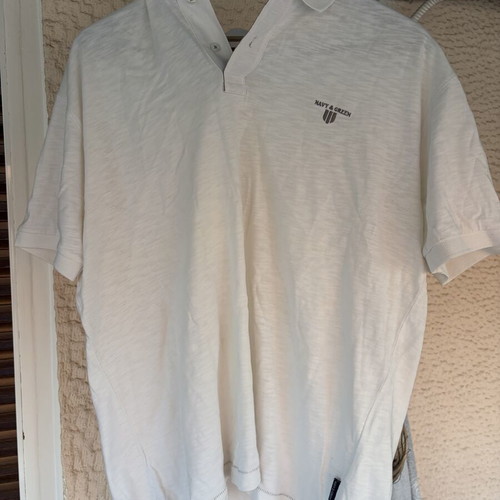 Two white polo shirts used, size XL, slight yellow stain on one