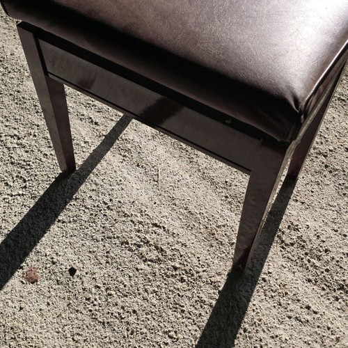 Adjustable piano stool used
