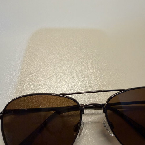 U.S. POLO ASSN. Aviator sunglasses like new, black metal frame, brown lenses