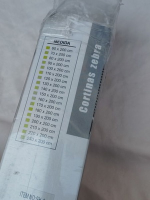 Zebra roller blind system