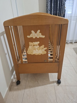 Baby cot made of solid wood with slats and drawer, like new