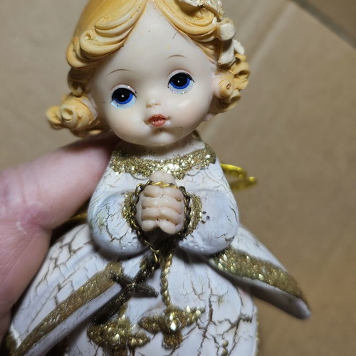 Ceramic decorative angel figurine used