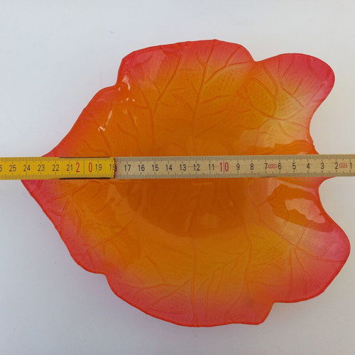 Glass leaf-shaped platter used, orange