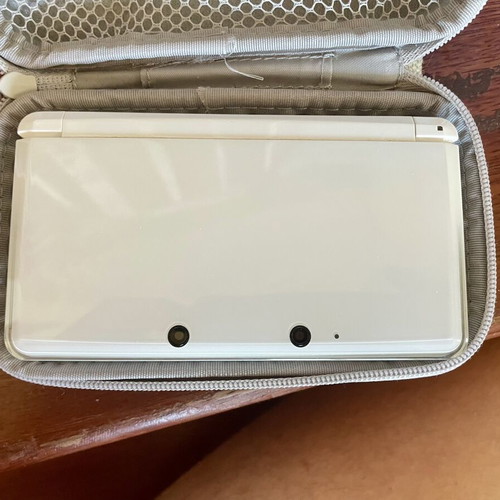 Nintendo 3DS white console with charger and case