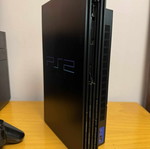 PlayStation 2 console used, does not read CD/DVD, missing covers