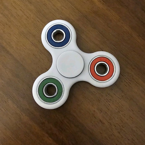 Fidget spinner used, white