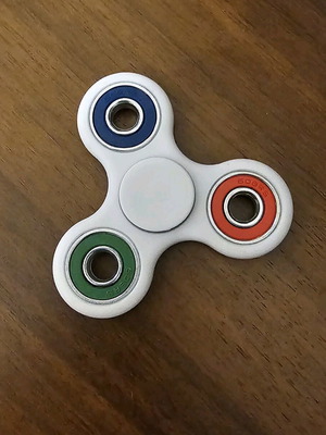 Fidget spinner used, white