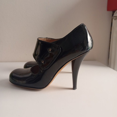 Paco Gil women's pumps size 35.5 like new black and gold