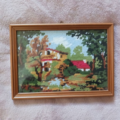 Embroidered textile painting in frame like new, house in forest