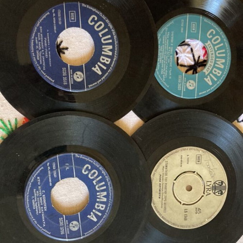 Vinyl 45 rpm records used, pack of 12 with Greek and foreign songs