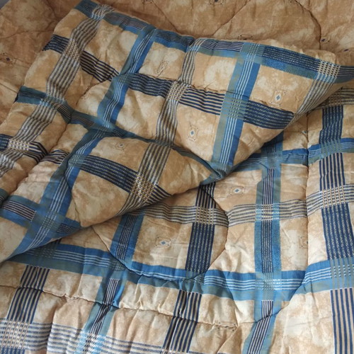 Double quilt used, thick, cream-blue with modern patterns