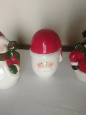 Salt shakers with snowman and Santa Claus pack of 3 like new