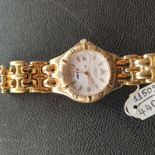 Ellesse watch unused, gold color