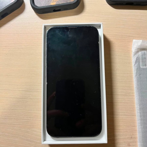 Apple iPhone 14 128GB Midnight with 4 cases and 4 screen protectors
