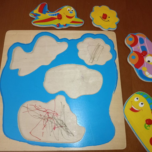 Wooden Puzzle with Handles used, Transport and Sun