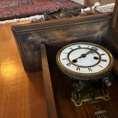 Wood-carved pendulum wall clock used, analog