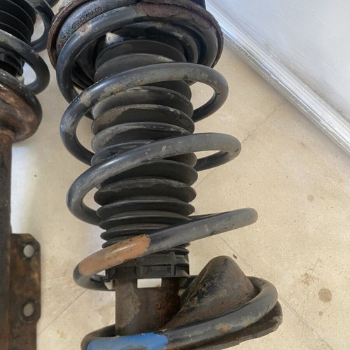 Ford Escort front shock absorbers complete with springs and mounts used
