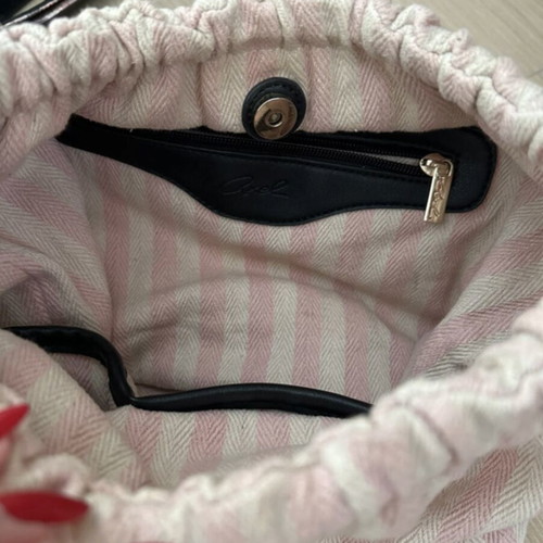 Axel bag like new, crossbody, black and pink