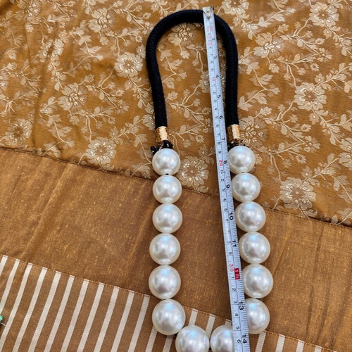 Pendant like new with large black and white beads