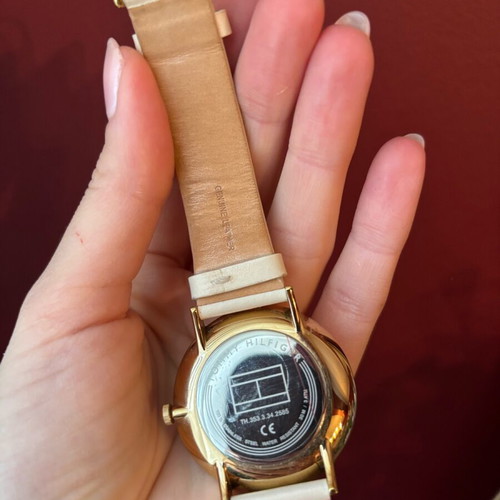 Tommy Hilfiger women's watch like new with gold case and beige leather strap