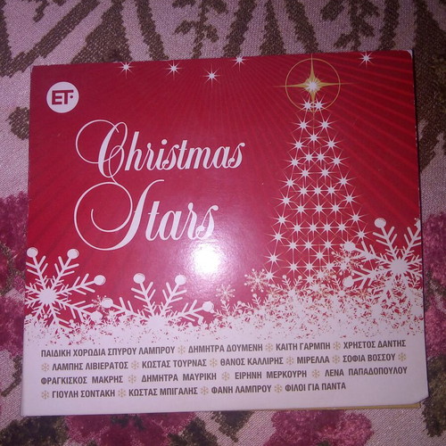 CD with Christmas songs like new
