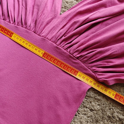 Figaro top like new, elastic with unique fuchsia-purple color