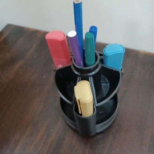 Rotating plastic pencil holder like new with contents