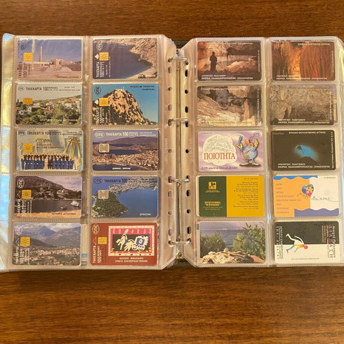 Phone cards set of 420 pieces like new with album