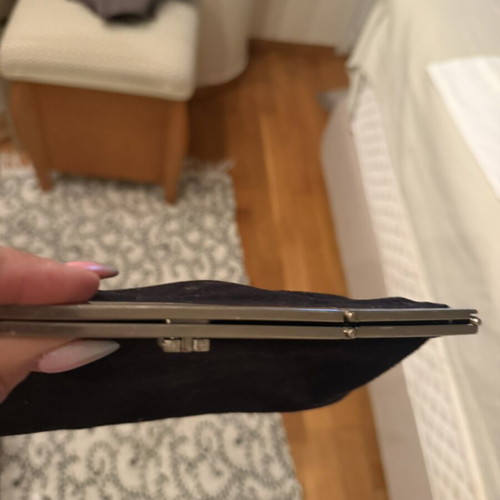 Salvatore Ferragamo black velvet clutch with silver metal frame