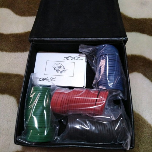 Playboy playing cards and chips like new, 100 pieces, four colors