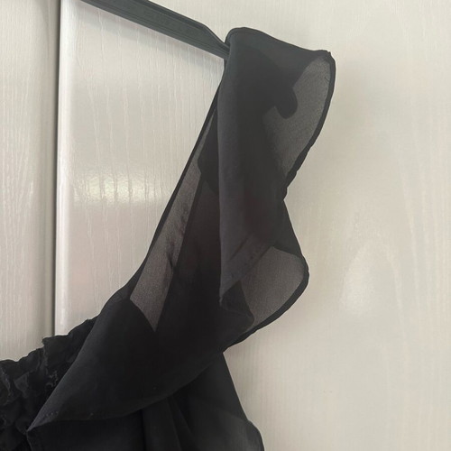 Black dress with ruffles used, size medium