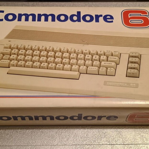 Commodore 64C used with original power supply, cassette player, and manuals