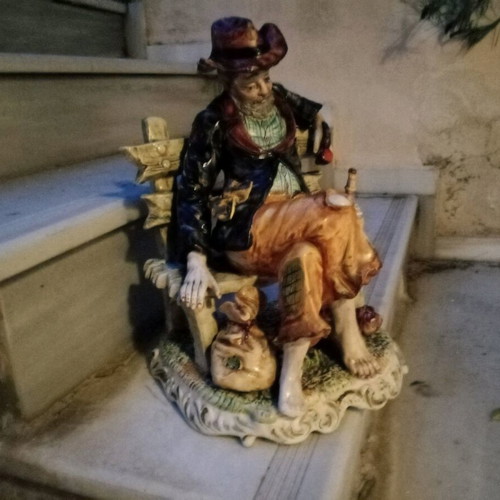 Italian porcelain vintage figure of old man with wine jug and pipe used