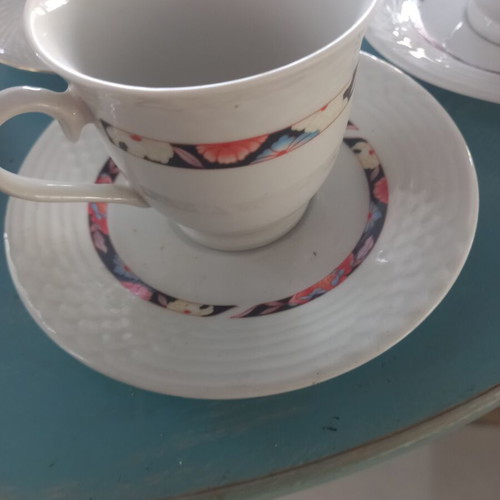 Set of 7 assorted cups and saucers