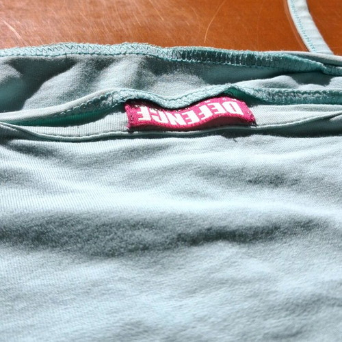 Defence women's top XS turquoise like new