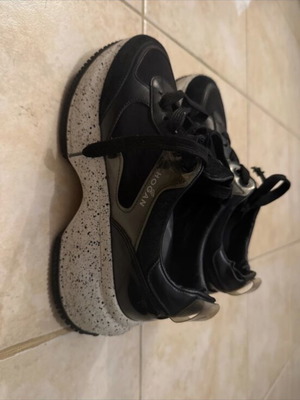 Hogan black sneakers used with visible wear