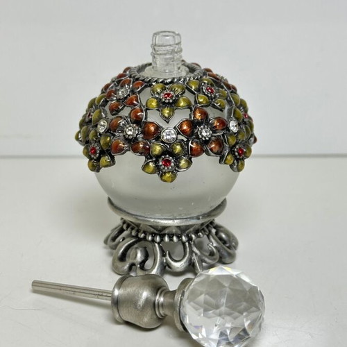 Vintage glass perfume bottle with floral enamel decoration