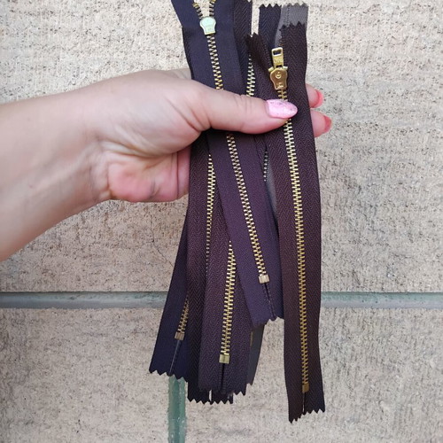 Metal and plastic sewing zippers YKK, assorted colors and sizes, pack