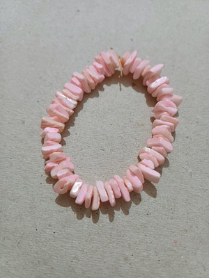 Bracelet used, may need elastic replacement