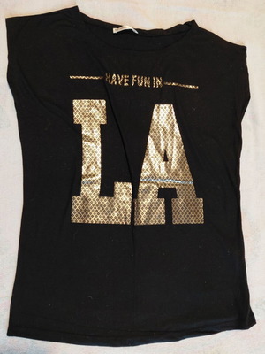 Black top with gold print like new, size M